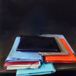 Disorganized stack of colorful stuffed file folders (in orange, blue, black, gray and red) against black background.
