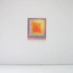 A neon abstract painting hangs on a white wall.