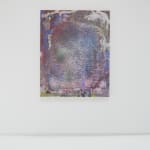 Front view of a multicolored abstract painting hanging on a white wall.