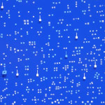 Detail; minuscule cut-outs of white paper form organized clusters on a blue background. Several 3D cut-outs in the same blue as the background are interspersed.