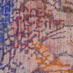 Detail; raised lines create a fibrous pattern over multicolored canvas.
