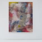 A brightly colored, multicolored abstract painting hanging on a white wall.