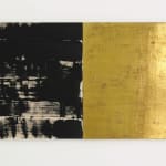 Two halves of a rectangular panel The right half is covered in layered Swiss gold leaf while the left is covered in uneven swashes of black paint