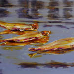 Three dead herrings floating on reflective water surface.
