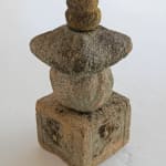 Small weathered Japanese stone sculpture.