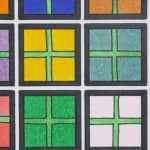 Detail; close view of the individual squares that make up the grid. All squares are bordered in black with a green cross in the center.