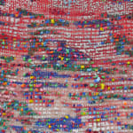 Detail; multicolored, raised striations over multicolored canvas.