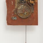 Rust-toned assemblage resembling old style wall clock with pull chain
