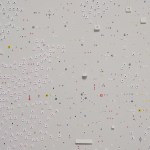 Detail; scattered square white cutouts with blue, red, and yellow dots on a white background with scattered 3D white flaps.