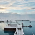 Lone figure stepping into hot pools in Iceland at Myvatn Nature Baths, by Massimo Vitali