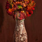 Abelardo Morell Flowers for Lisa #22 digitally composited image of orange flower in painted vase