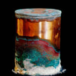 colorful minerals on copper canister, by David Maisel