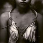 Night blooming cereus around Jessie's neck, from the Immediate Family series, by Sally Mann