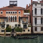 Gail Albert Halaban Out My Window Italy Italian Views Out My Window, Moving, San Marco, Venice, October, 2017 family moving with cat and fragile box in window of Venitian building gondola in canal