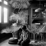 Imogen Cunningham, Ruth Asawa in Her Dining Room with Tied-Wire Sculptures, 1963