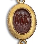 Roman, A large Roman banded agate astrological intaglio set in a modern gold ring, circa 1st century AD