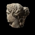 Roman, A Roman marble fragmentary head of a sleeping woman, circa 2nd century AD