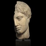 A Roman marble fragmentary Polykleitan head of the ‘Westmacott Athlete’ type