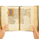 a richly illuminated medieval manuscript, an Italian Book of Hours made in Roma, signed and dated