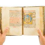 a richly illuminated medieval manuscript, an Italian Book of Hours made in Roma, signed and dated
