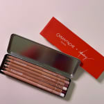 The name comes from the artist CJ Hendry and the Caran D'Ache giveaway at her London exhibition.