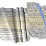 Ocean Wave shown in different configuration. The two pieces to this work may be repositioned in their grouping or be separated into two pieces for display according to the viewer's experience.