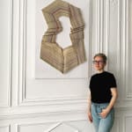 Artist with piece at Unity in Variety IX Group Show in London.