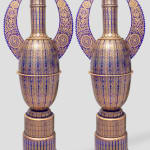 Bohemian Glass Manufactory Monumental pair of blue and gilt glass "Alhambra" amphoras on stepped pedestals, circa 1900 important and spectacular pair of blue and gilt glass amphoras of "Alhambra" form, decorated with repeating gold enamel arabesque designs, with applied cut glass flat handles, on stepped pedestals 192 x 64 x 43 cm