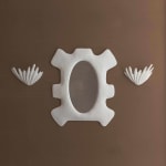 Arundel sculptural mirror with ocean sconces
