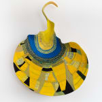 PRAYER. PATTERN. PRAYER, Lilian Shtereva sitting on a stump with a pillow sham, near the shrub roses - close to...