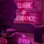 Queen in Residence neon on vintage flag