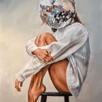 woman sat on stool with disco ball on head
