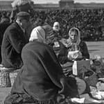 “Bread and Hope: A Family’s First Meal in America” Ellis Island NYC, c.1900s”, c.1900s