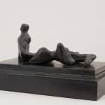 Bronze sculpture of a reclining woman by Henry Moore