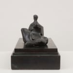 Bronze sculpture of a reclining woman by Henry Moore