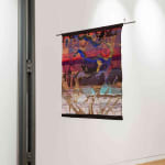 Jacquard textile artwork by Arda Asena, featuring intricate weaving techniques and abstract imagery, displayed at Galerie REVEL.