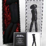 The Black Doll. Doll and box