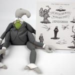 Uncorrected proof of The Headless Bust by Edward Gorey. Front cover with Bahhumbug doll
