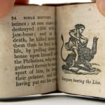 History of the Bible. Interior page, engraving of Samson and the lion.