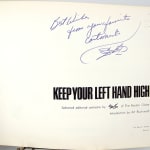 Keep Your Left Hand High. Together with: In Search of Sacred Cows illustrated by Szep. Title page with inscription.