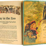 A Day in the Zoo. Realistic Pictures of Birds Beasts and Fishes. A Reproduction of an Antique Pop-up Book. Pop-up of big cats in cages. Front and back cover boards.