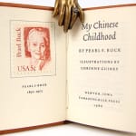 My Chinese Childhood by Pearl S. Buck, illustrated by Corinne Guiney. Title page and postage stamp.