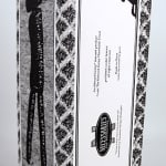 The Black Doll. Box