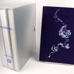 Arctic Trilogy by Mary Heebner. Acrylic slip case and dark blue volume.