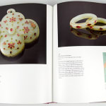 East Meets West: Jewels of the Maharajas from The Al Thani Collection. by Martin Chapman and Amin Jaffer. Interior page showing jewelry.