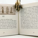 The Saintmaker's Christmas Eve. Illustrated text spread