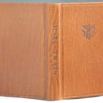 Mark Twain Compliments the President's Wife. Cover boards.
