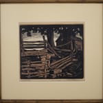 A framed photo of In Hutchinson's "The Water Hole," the composition features a rural scene with a strong contrast between the dark and light areas, which is typical of woodcut prints due to the nature of the technique.