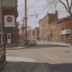 Old brick buildings and a vintage car