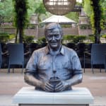 Bronze bust of Bill Roche holding a potted plant, installed at Hunter Valley Gardens, symbolizing his legacy.